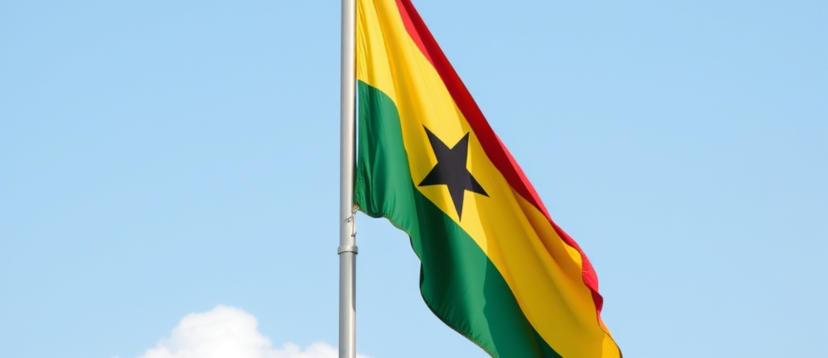 Ghana Flag on a flagpost standing tall in the sky